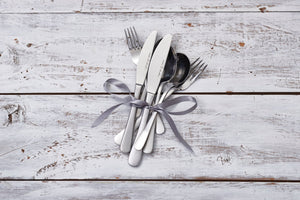 cutlery - knife, spoon and fork tied ribbon